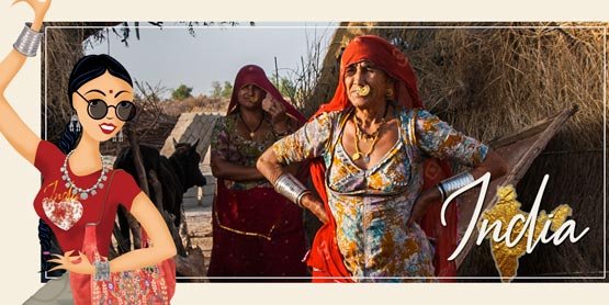 our travel experts take you to amazing india in this photo are featured two ladies of jodphur in tradtional village dress amongst their huts and cattle with a cartoon depiction of debbie allen our blogger extraordinaire flaunting all that is bollywood
